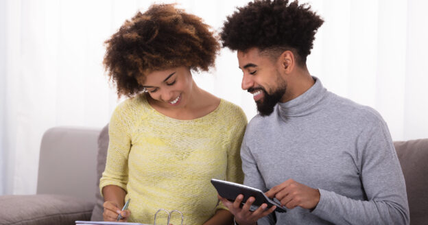 Young couple working on their finances